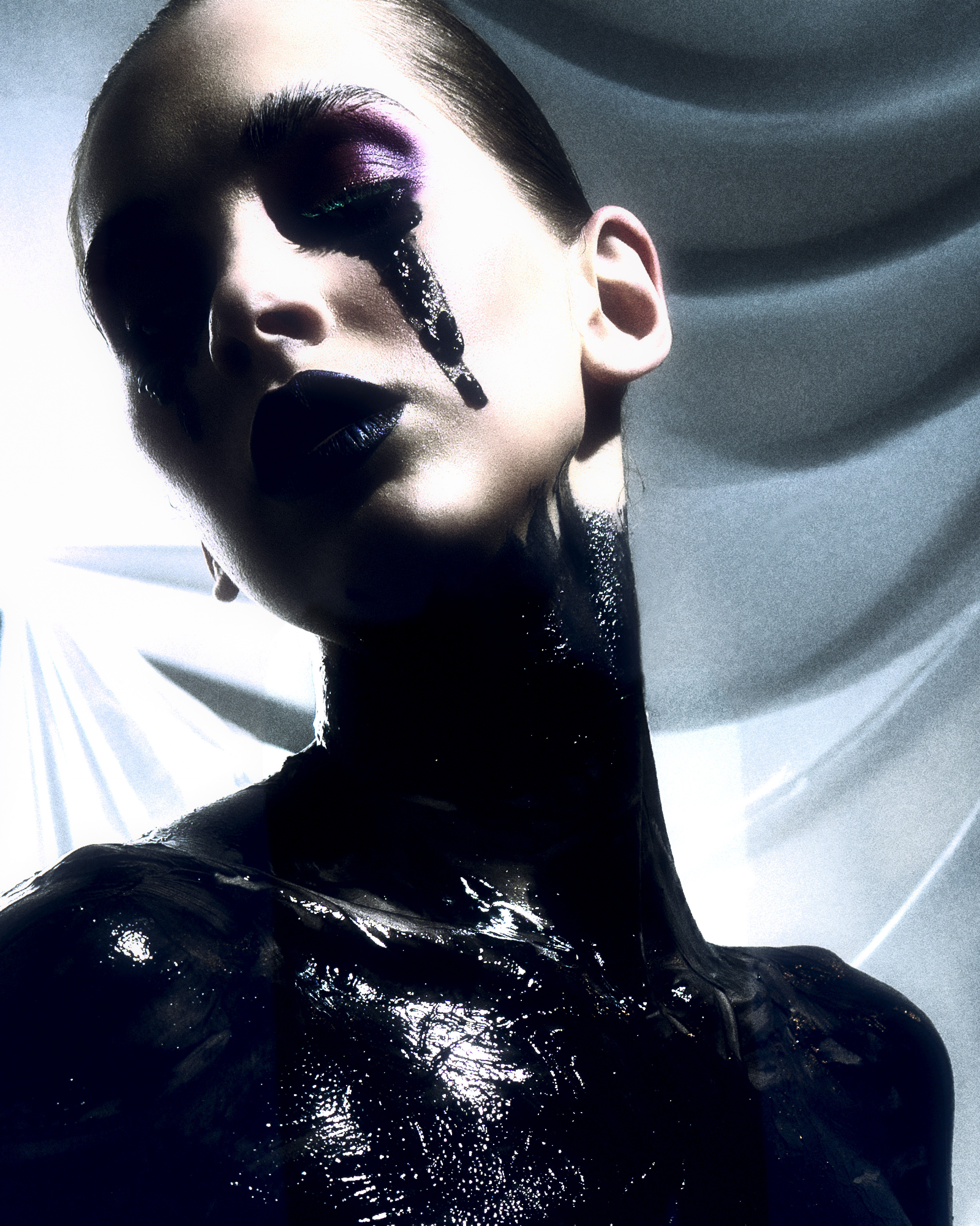 fine art editorial portrait — model with black paint dripping from eyes and lips, dramatic lighting, Black Gold series by Toronto photographer Daniyar Sadykov